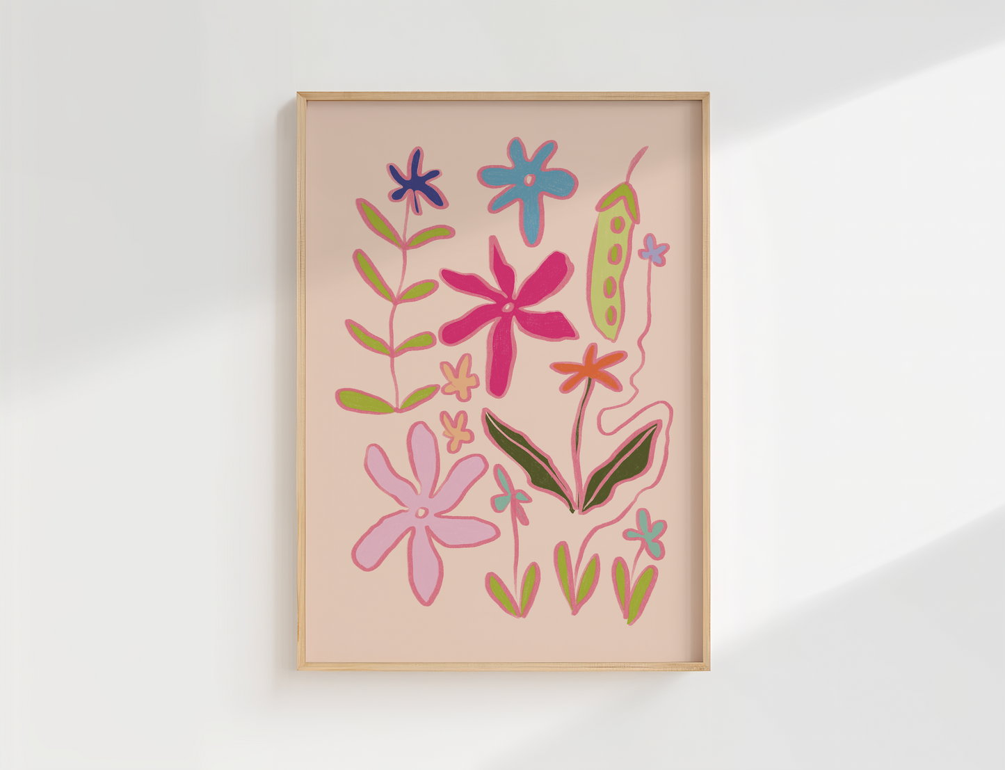 Framed artwork with colourful floral design on a light background