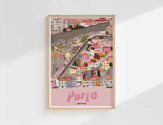 Framed hand-drawn artwork of Porto, Portugal with colourful buildings, set against a white wall
